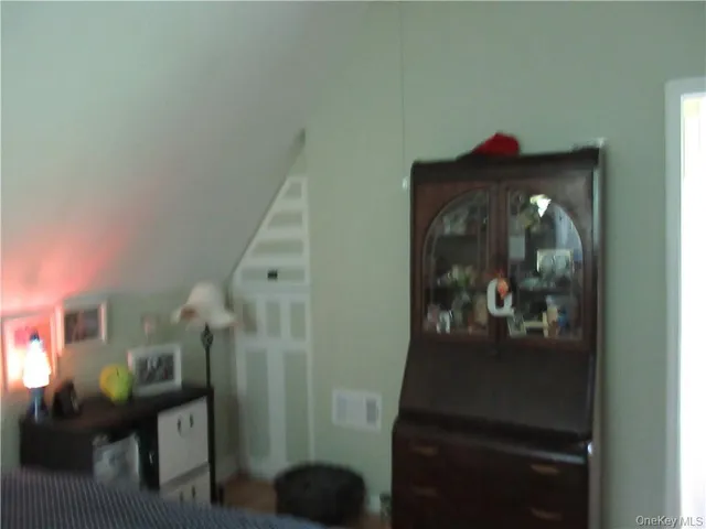 a view of workspace with furniture and window