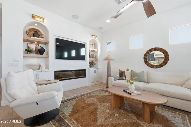 a view of a livingroom with furniture and closet
