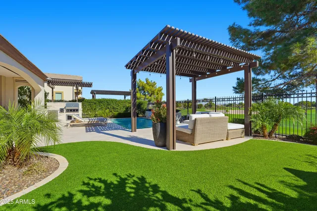 a aerial view of a house with a yard