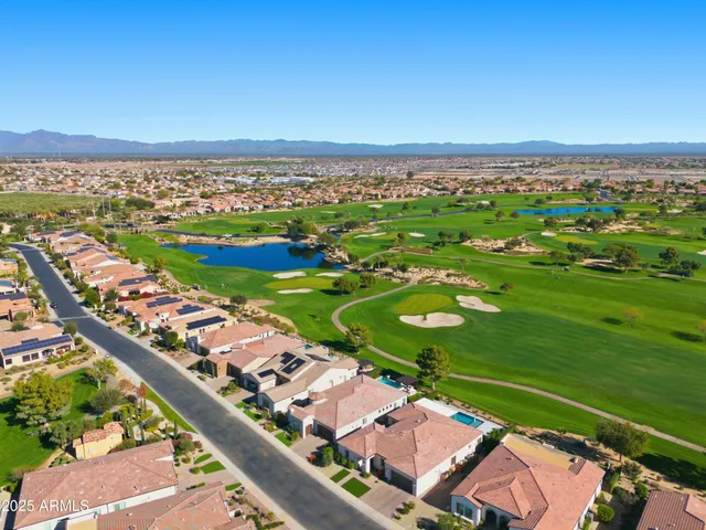 a view of front door with wooden floor