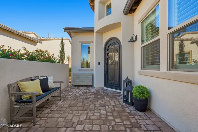 a large kitchen with a table and chairs