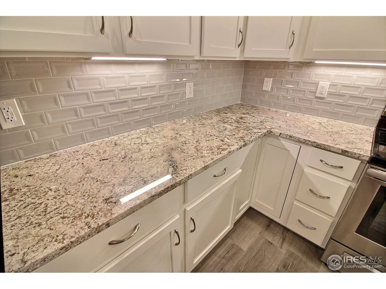 4672 West 20th Road, Unit 724 Greeley, CO 80634 - Photo 14 of 36 Granite-Under Cabinet