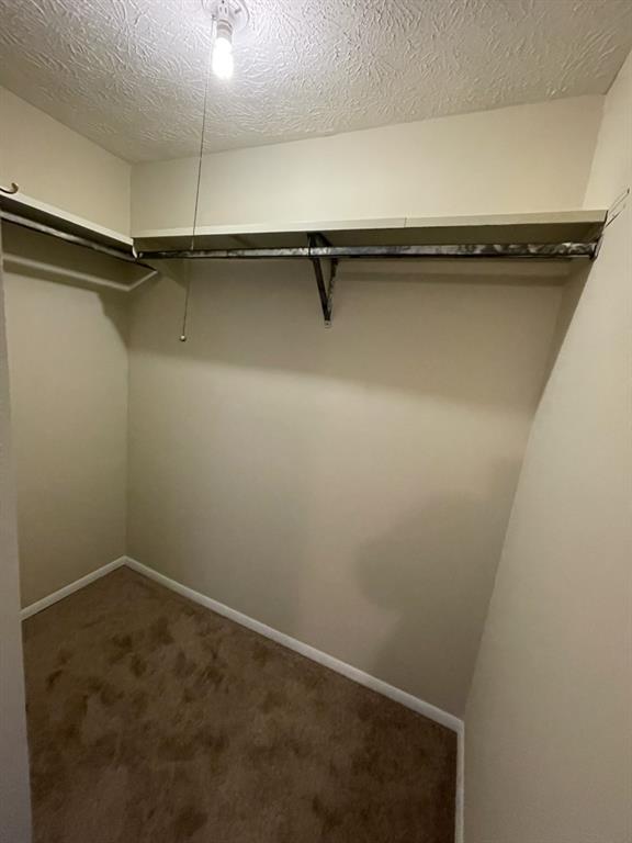 110 Roswell Commons Way Roswell, GA 30076 - Photo 14 of 26 an empty room with a cabinet