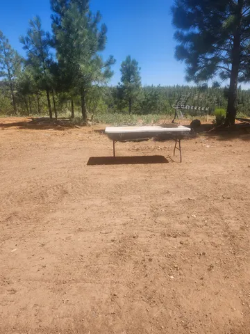 a view of a lake with a yard