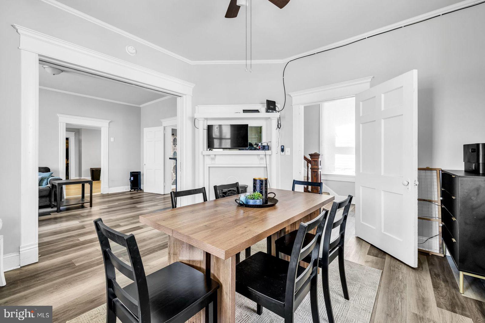 406 High Street Cambridge, MD 21613 - Photo 7 of 24 a view of a dining room with furniture
