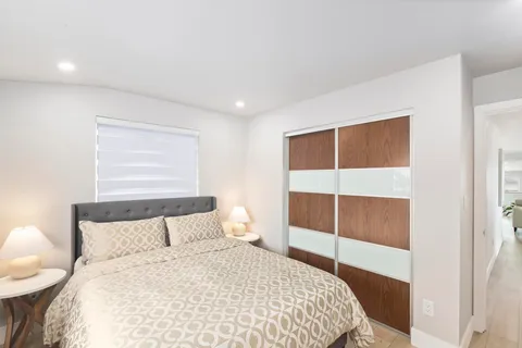 a view of swimming pool with a patio