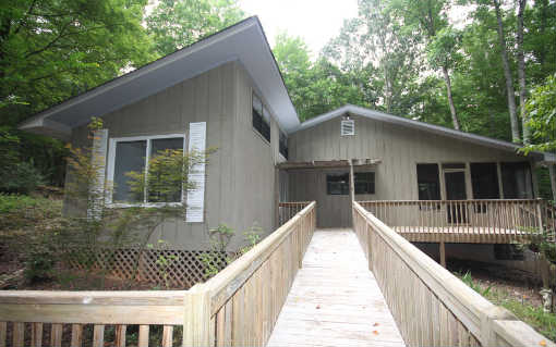 a front view of a house with a balcony