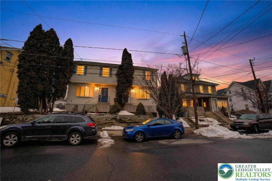 a car parked in front of a building