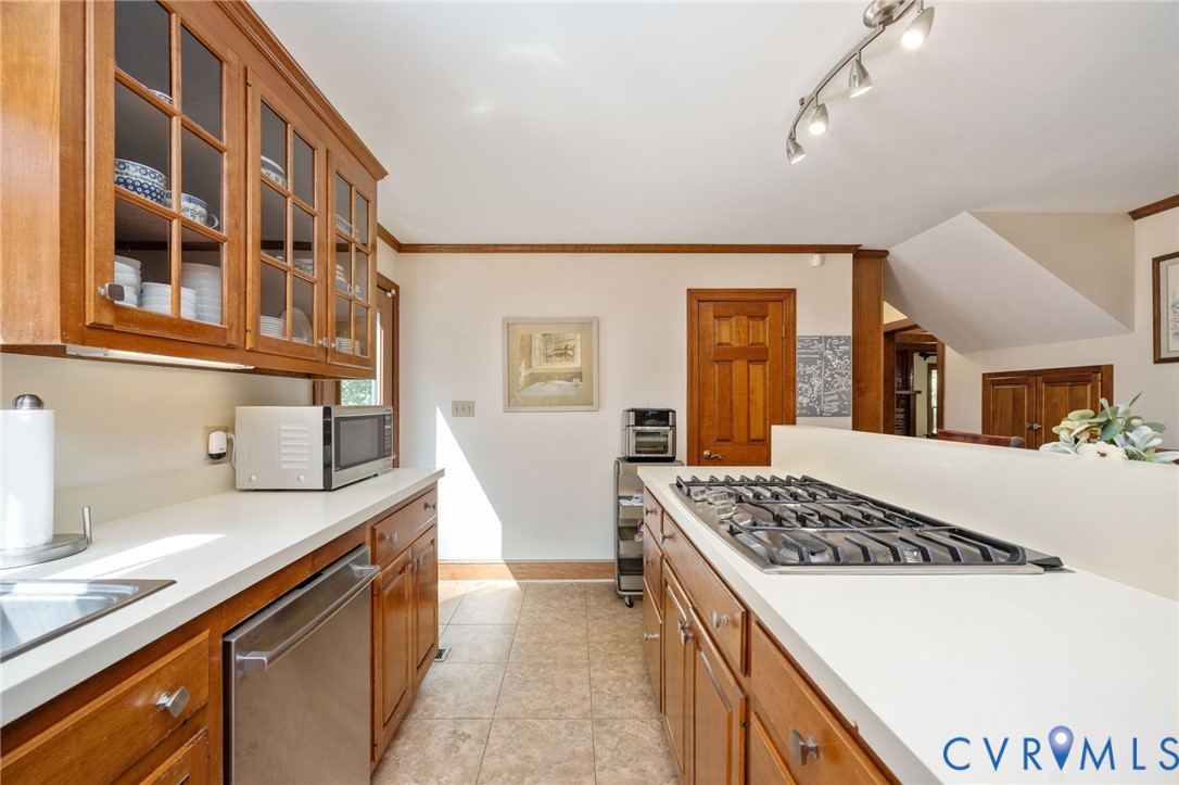 1801 Georgetown Road Heathsville, VA 22473 - Photo 57 of 83 Kitchen featuring wood cabinetry, solid surface co