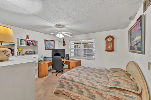 a bedroom with furniture and a fireplace