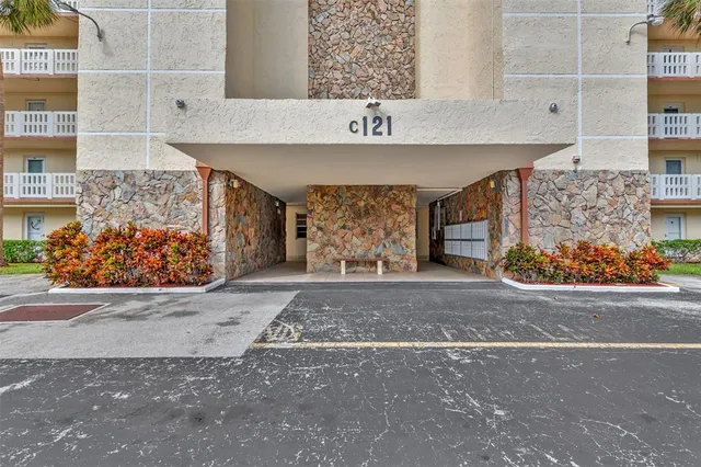 a front view of a building with an empty space