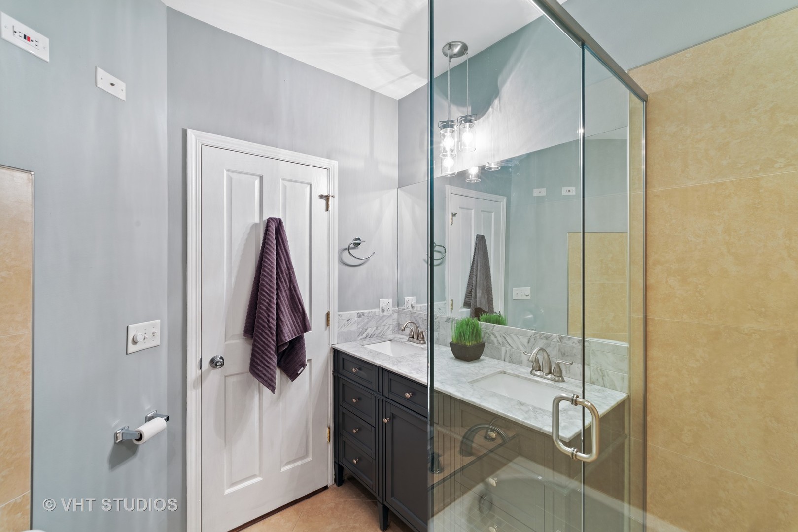 1733 South Ruble Street, Unit 1 Chicago, IL 60616 - Photo 15 of 19 a bathroom with a double vanity sink mirror and shower