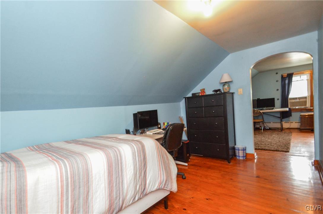 112 Trach Road Kunkletown, PA 18058 - Photo 22 of 33 a bedroom with a bed and wooden floor