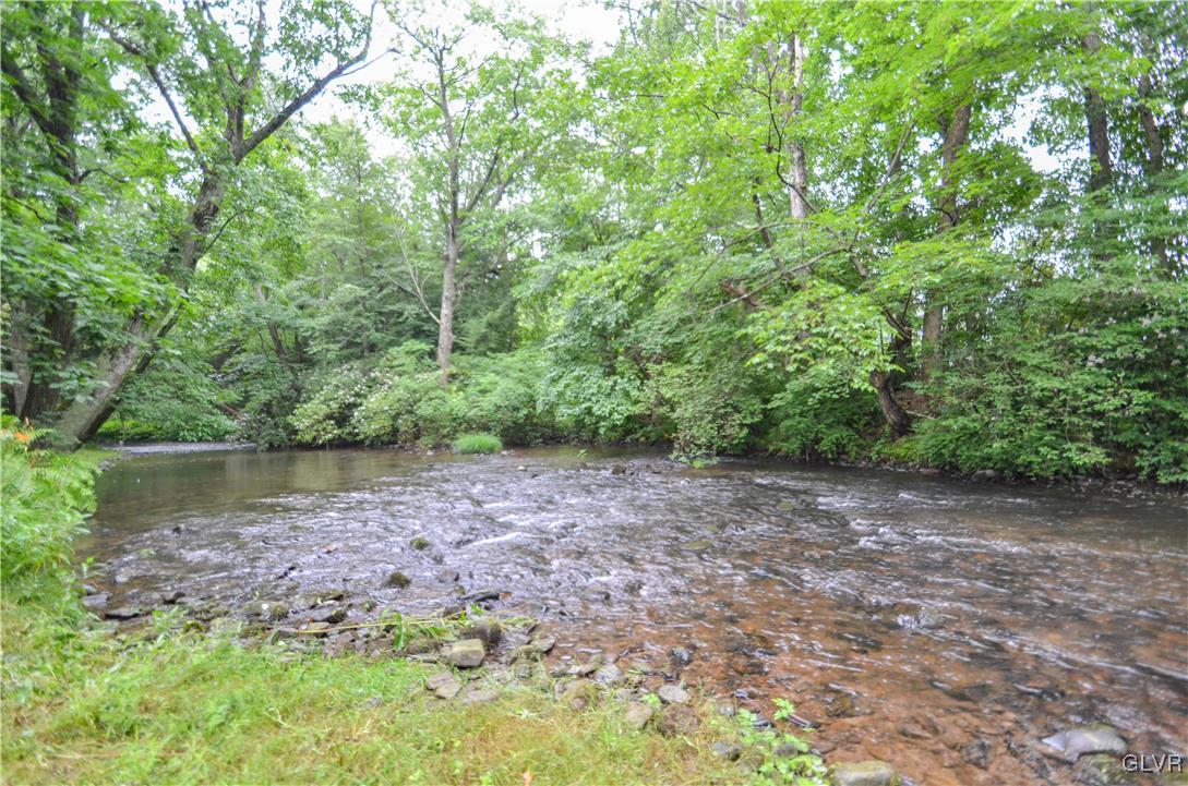 112 Trach Road Kunkletown, PA 18058 - Photo 3 of 33 a view of a lake with a forest