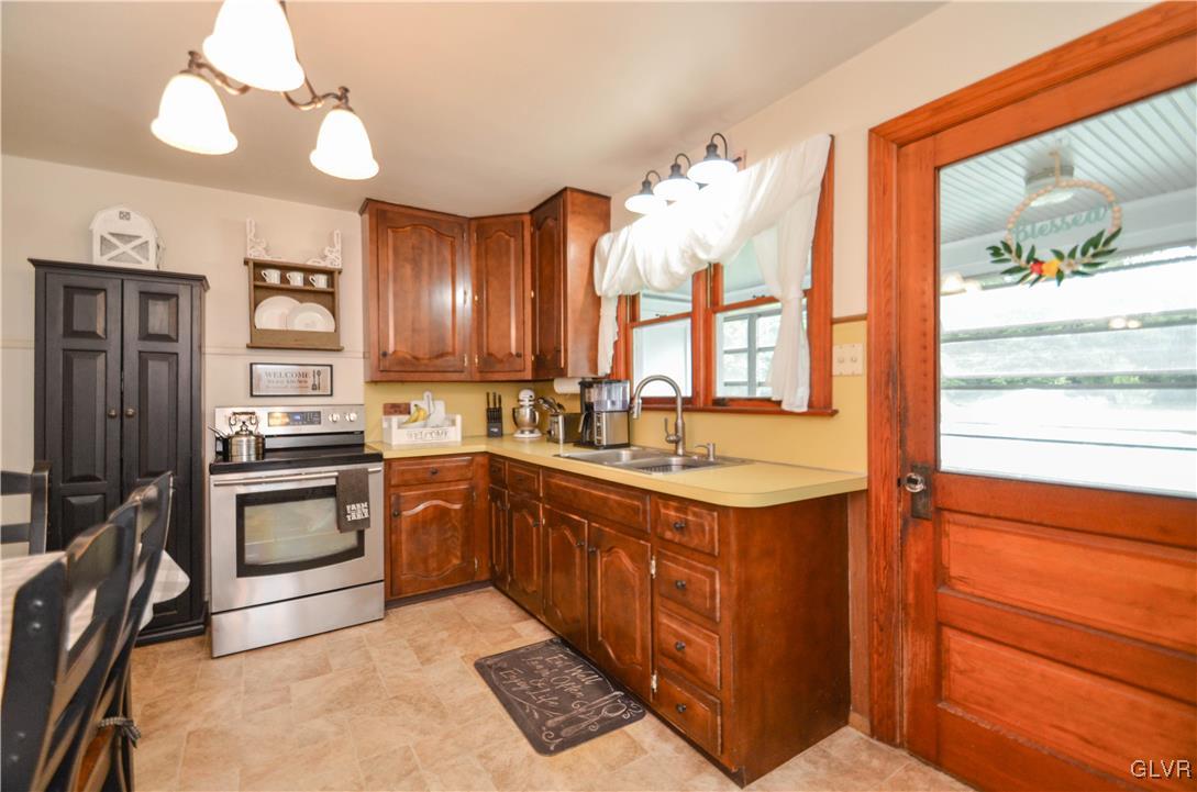 112 Trach Road Kunkletown, PA 18058 - Photo 7 of 33 a kitchen with a sink cabinets and stainless steel appliances