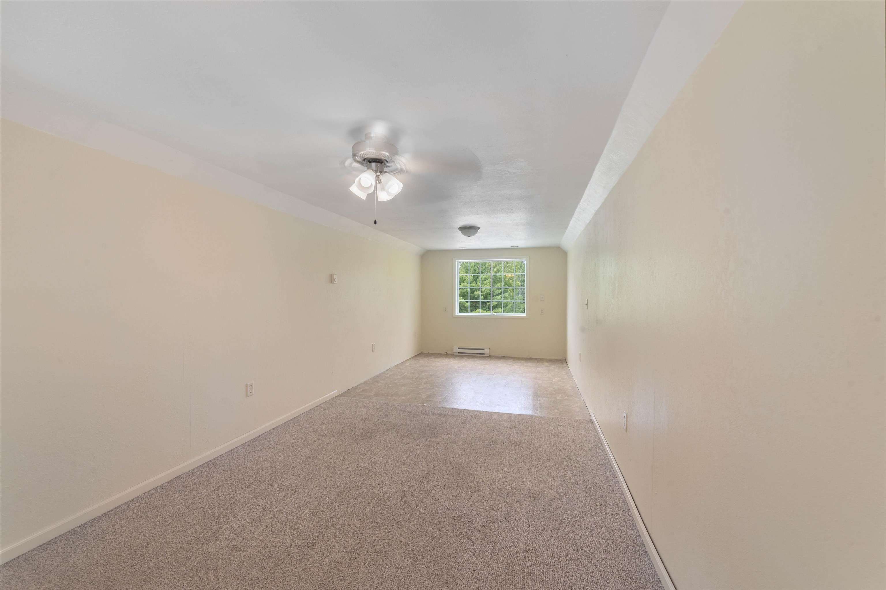 9372 McCamus Road Brookston, MN 55711 - Photo 16 of 49 Unfurnished room with light carpet and ceiling fan