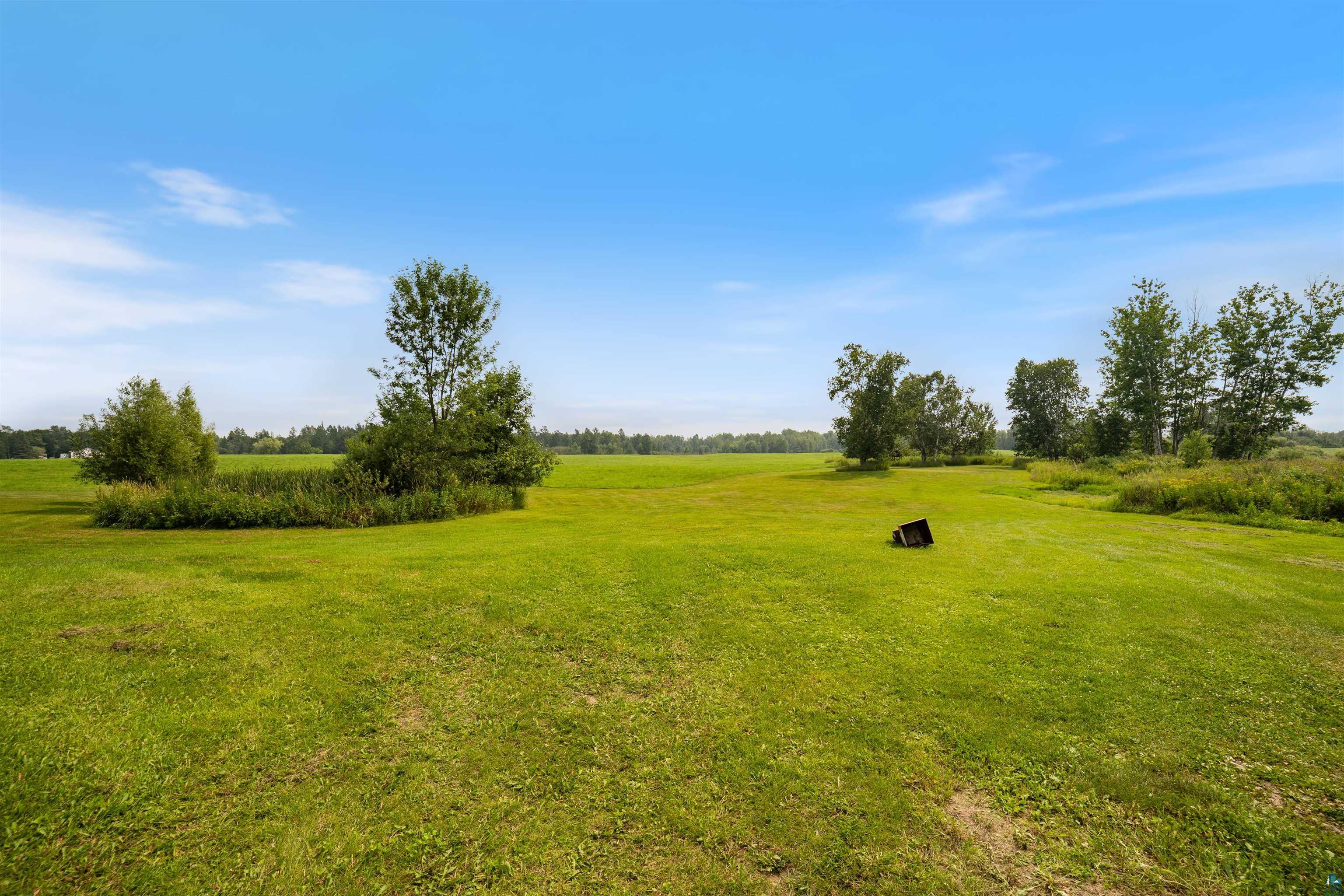 9372 McCamus Road Brookston, MN 55711 - Photo 47 of 49 View of grassy yard featuring a view of countryside
