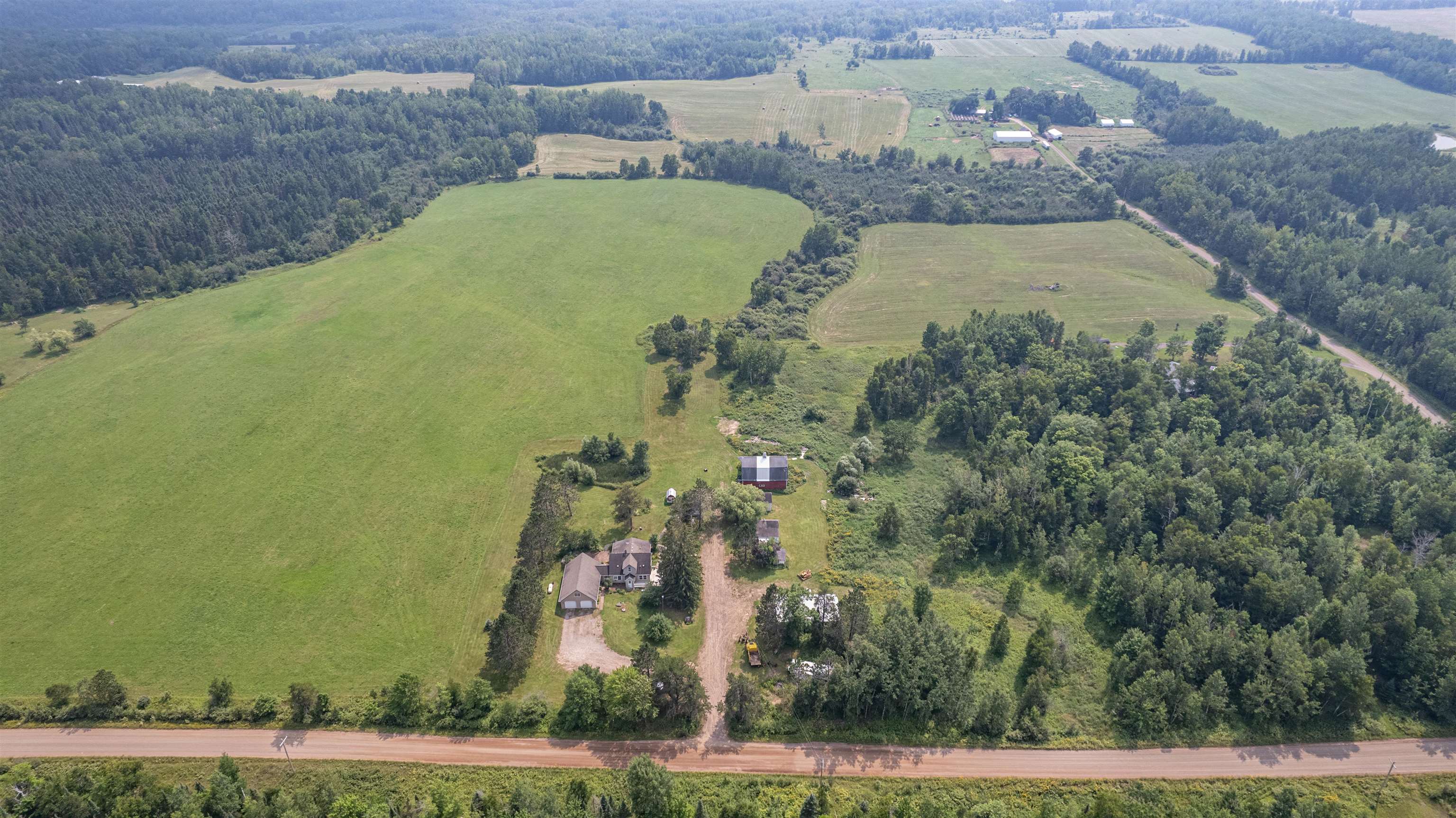 9372 McCamus Road Brookston, MN 55711 - Photo 48 of 49 Aerial view of sparsely populated area featuring a heavily wooded area
