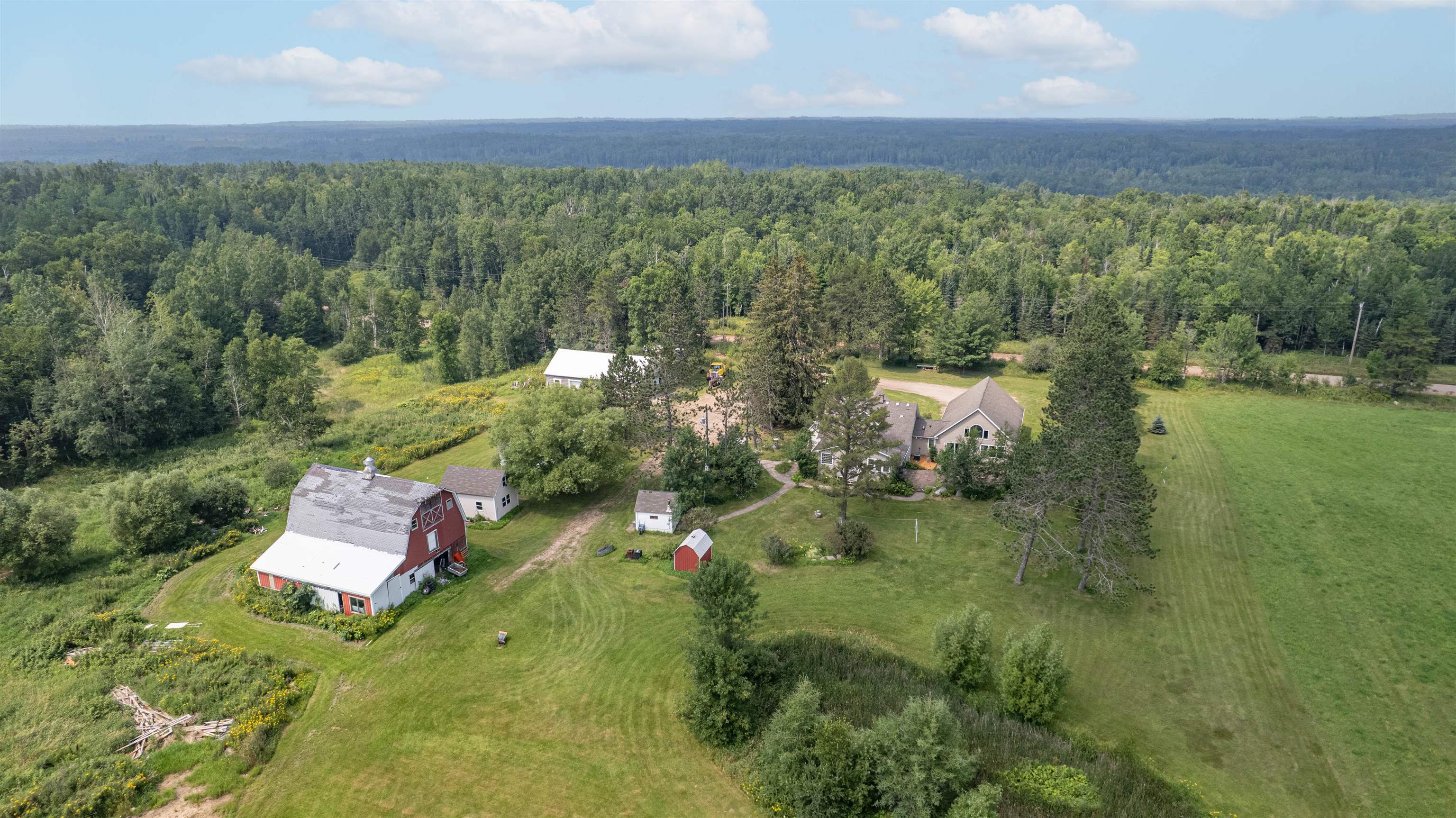 9372 McCamus Road Brookston, MN 55711 - Photo 9 of 49 Aerial overview of property's location featuring a forest