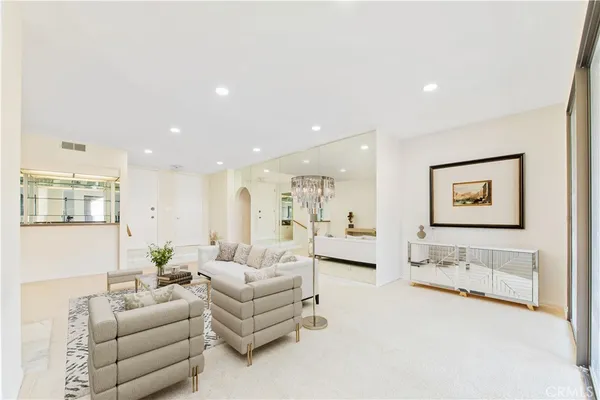 a living room with furniture and a couch