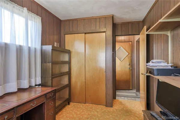 a kitchen with stainless steel appliances a refrigerator and a stove top oven