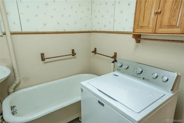 a bathroom with a sink and a bathtub
