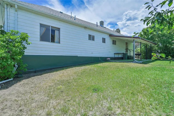 a view of a backyard with a garden