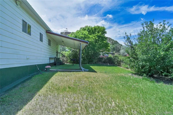 a view of a backyard with a garden