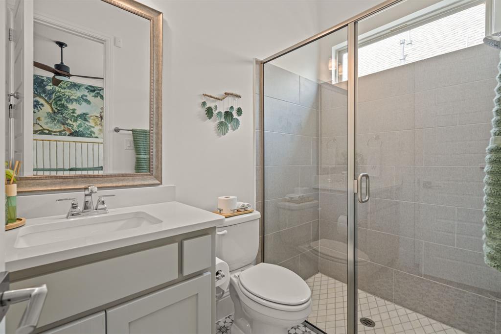 1616 Prairie Ridge Road Fort Worth, TX 76008 - Photo 8 of 40 a bathroom with a sink toilet and shower
