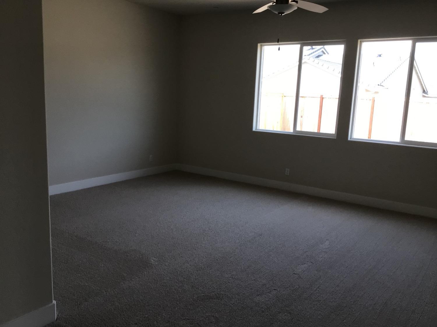 969 Ridgeline Road Madera, CA 93636 - Photo 14 of 16 an empty room with a window