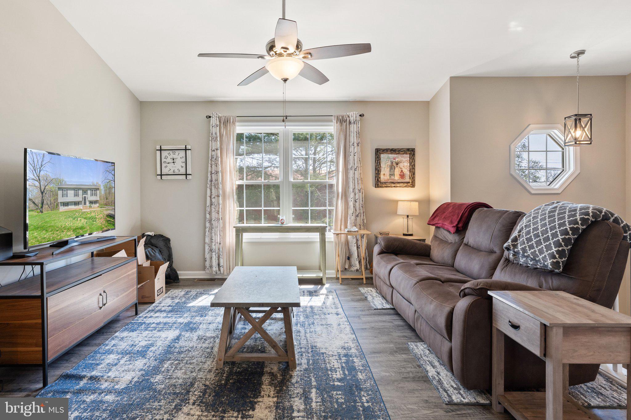 8584 Rixeyville Road Rixeyville, VA 22737 - Photo 8 of 48 Vaulted ceiling w/fan in the family room