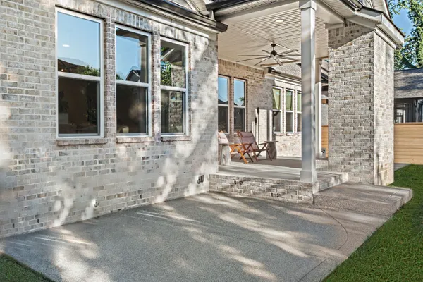 a view of a brick building with many windows
