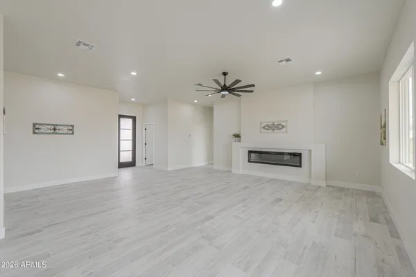 a bathroom with a double vanity sink mirror and shower