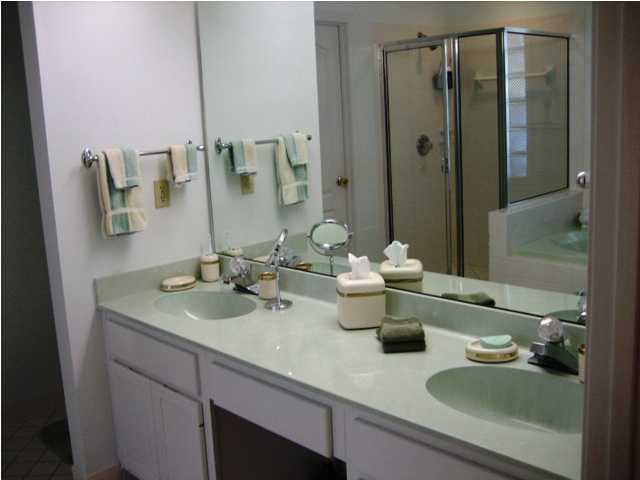 107 Bermuda Way Niceville, FL 32578 - Photo 13 of 19 a bathroom with a sink and a mirror