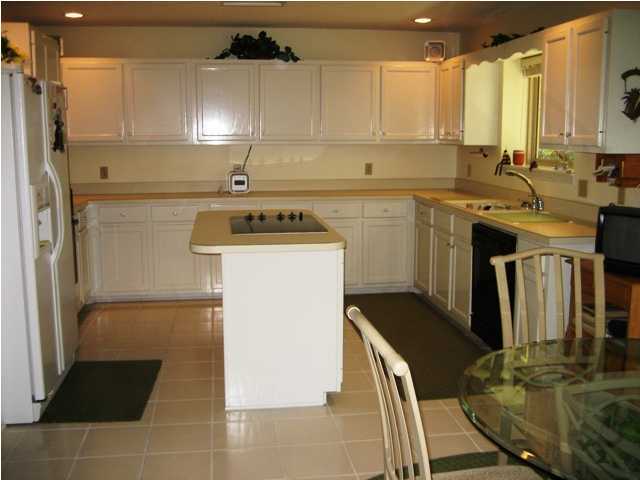 107 Bermuda Way Niceville, FL 32578 - Photo 14 of 19 a kitchen with a sink appliances and cabinets