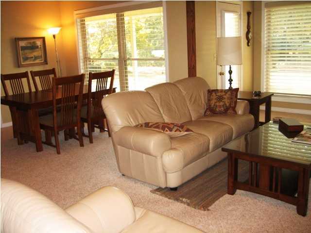 107 Bermuda Way Niceville, FL 32578 - Photo 5 of 19 a living room with furniture and a large window