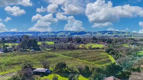 a view of a lake with a yard