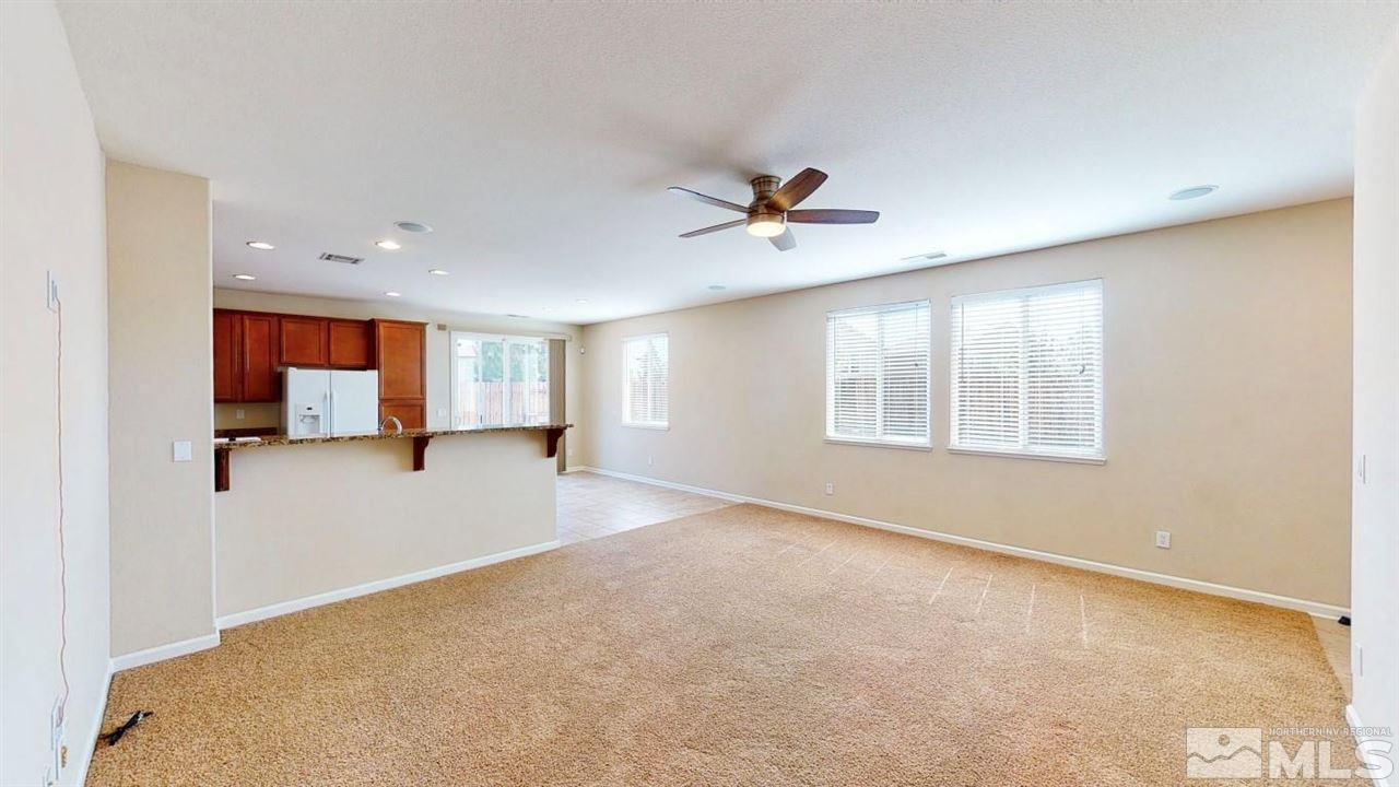 9196 Raytheon Court Reno, NV 89506 - Photo 11 of 23 a view of an empty room with a window