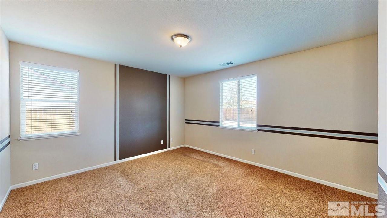 9196 Raytheon Court Reno, NV 89506 - Photo 16 of 23 a view of an empty room with a window