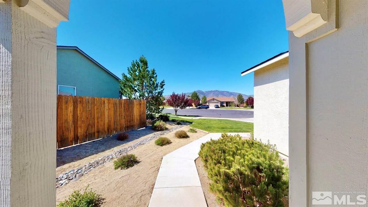 9196 Raytheon Court Reno, NV 89506 - Photo 17 of 23 a view of a backyard of the house