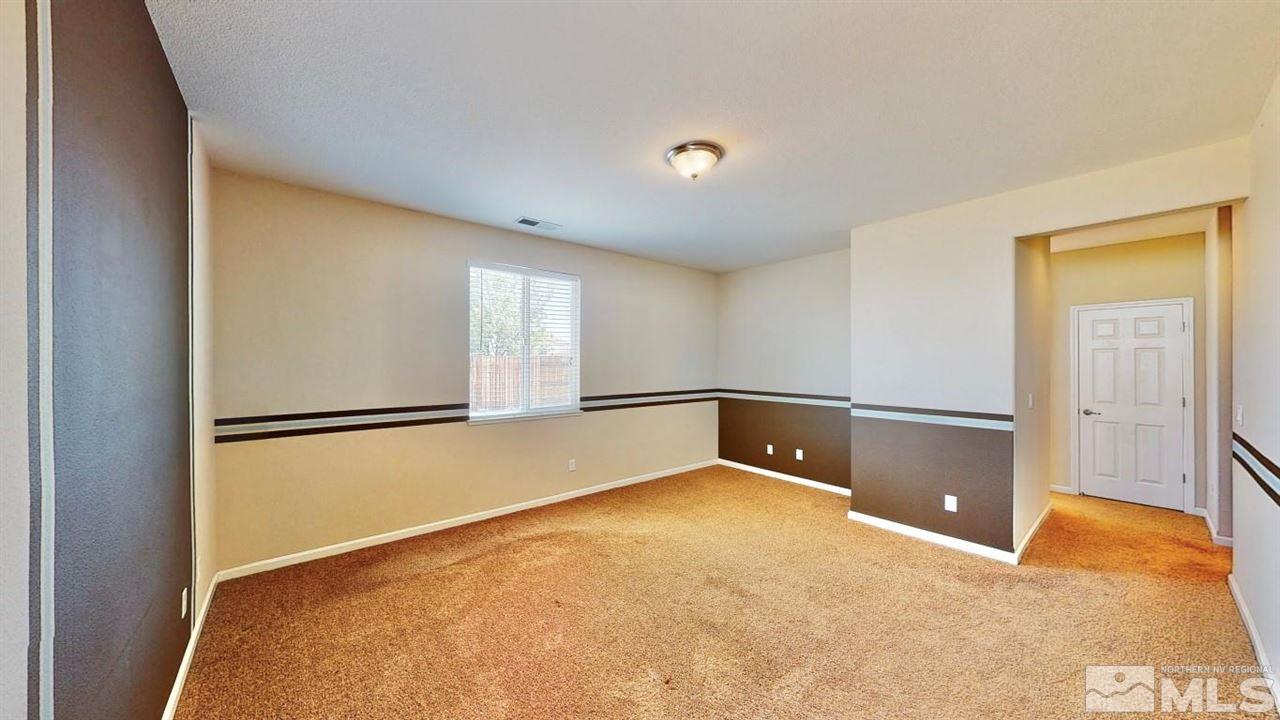 9196 Raytheon Court Reno, NV 89506 - Photo 10 of 23 a view of an empty room with a window