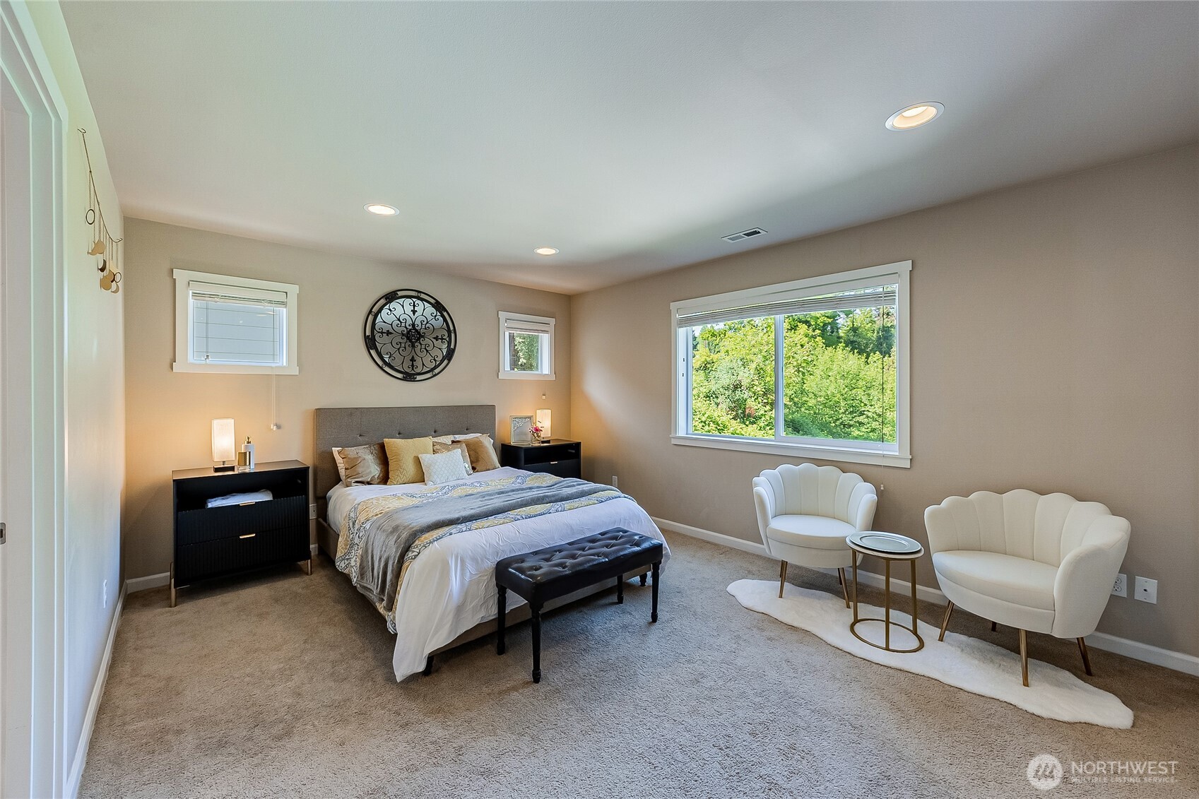 11501 87th Avenue South Seattle, WA 98178 - Photo 12 of 30 a bedroom with a bed and a chair