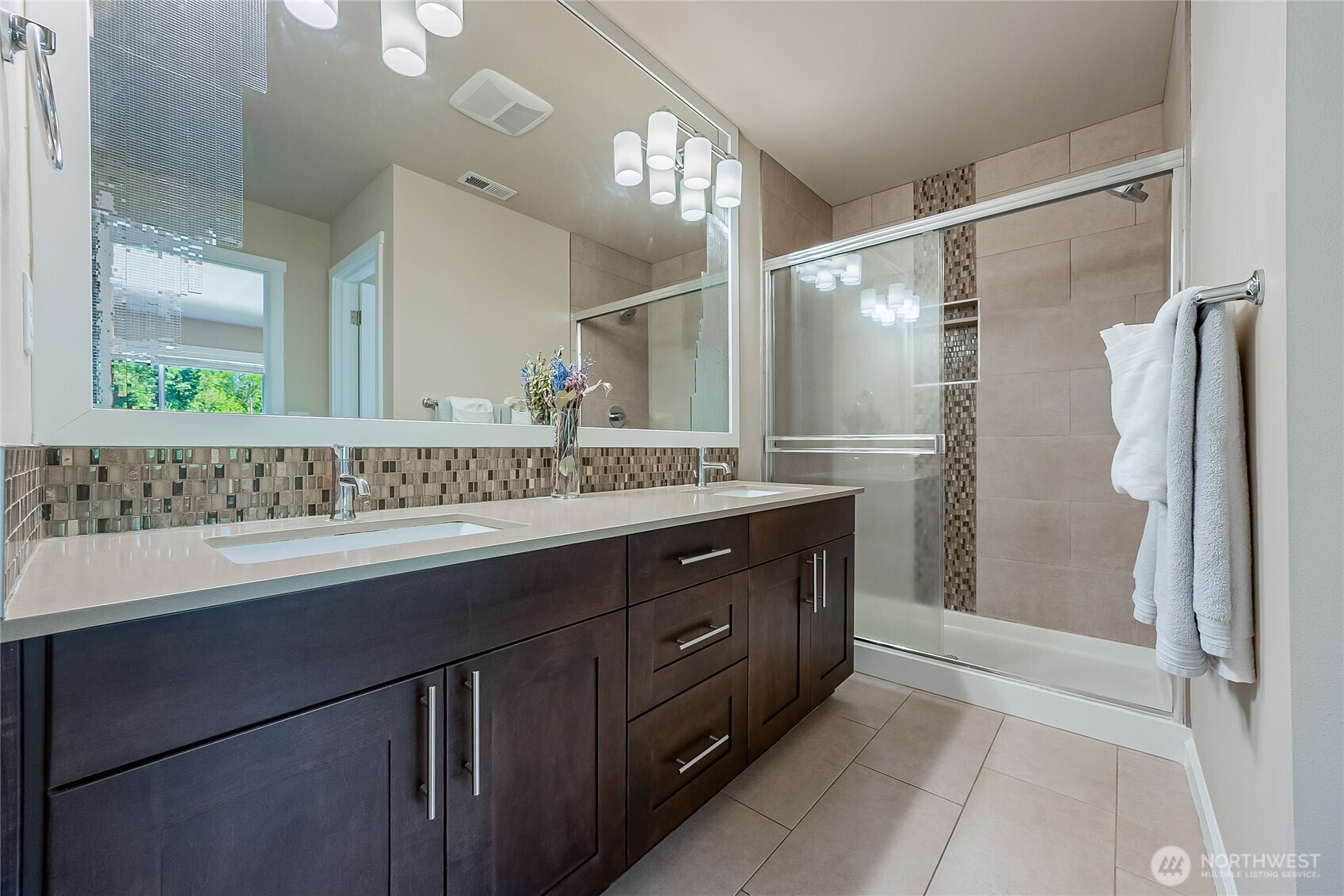 11501 87th Avenue South Seattle, WA 98178 - Photo 15 of 30 a bathroom with a sink and a mirror