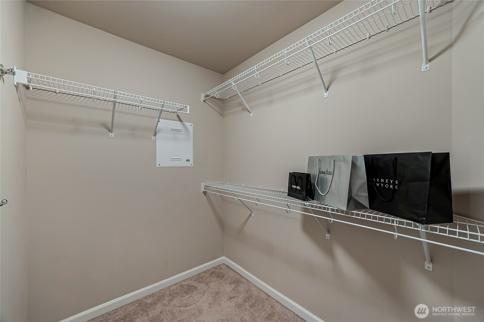 11501 87th Avenue South Seattle, WA 98178 - Photo 16 of 30 a view of a room with racks on the wall