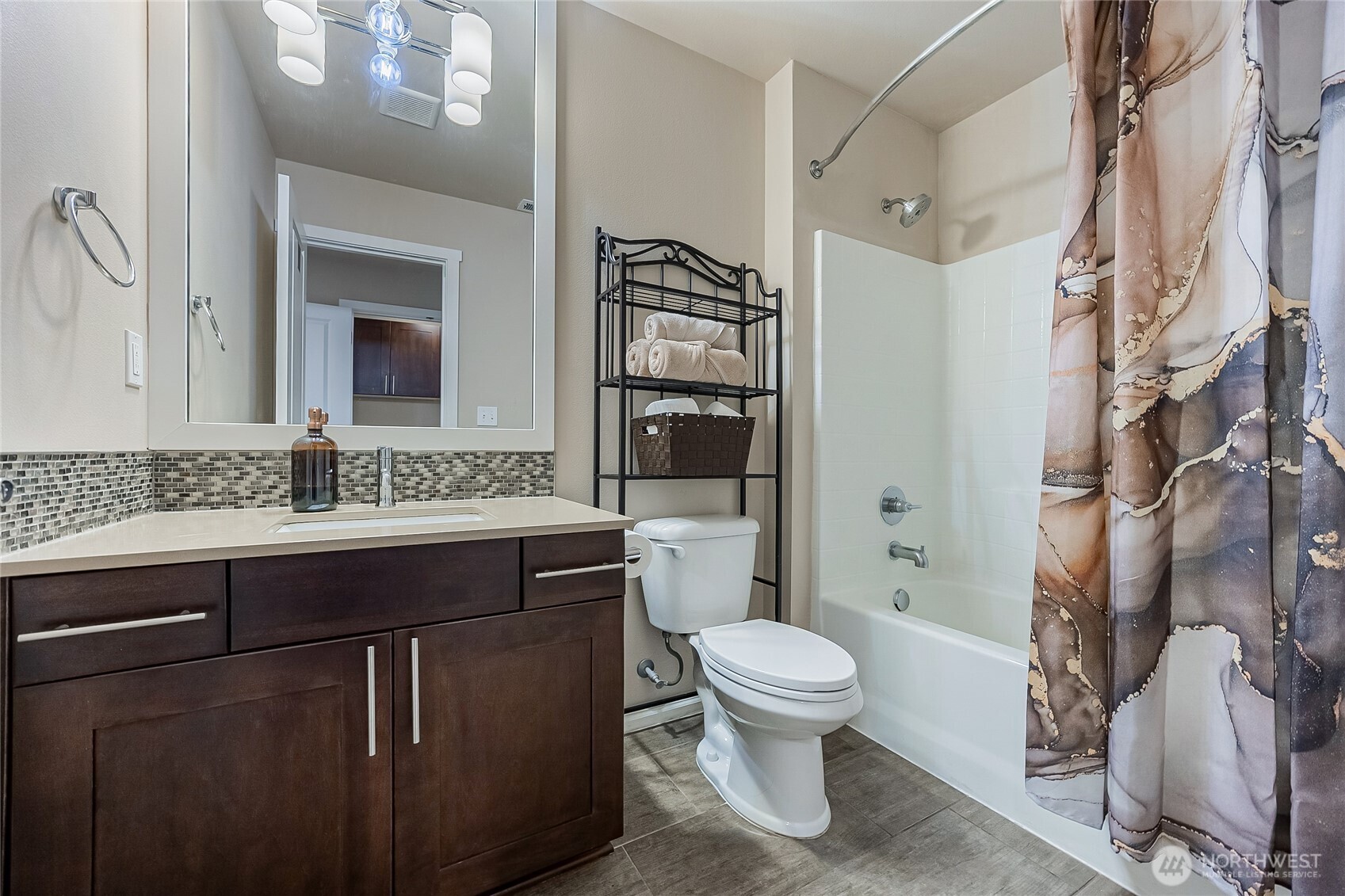 11501 87th Avenue South Seattle, WA 98178 - Photo 25 of 30 a bathroom with a sink toilet and shower