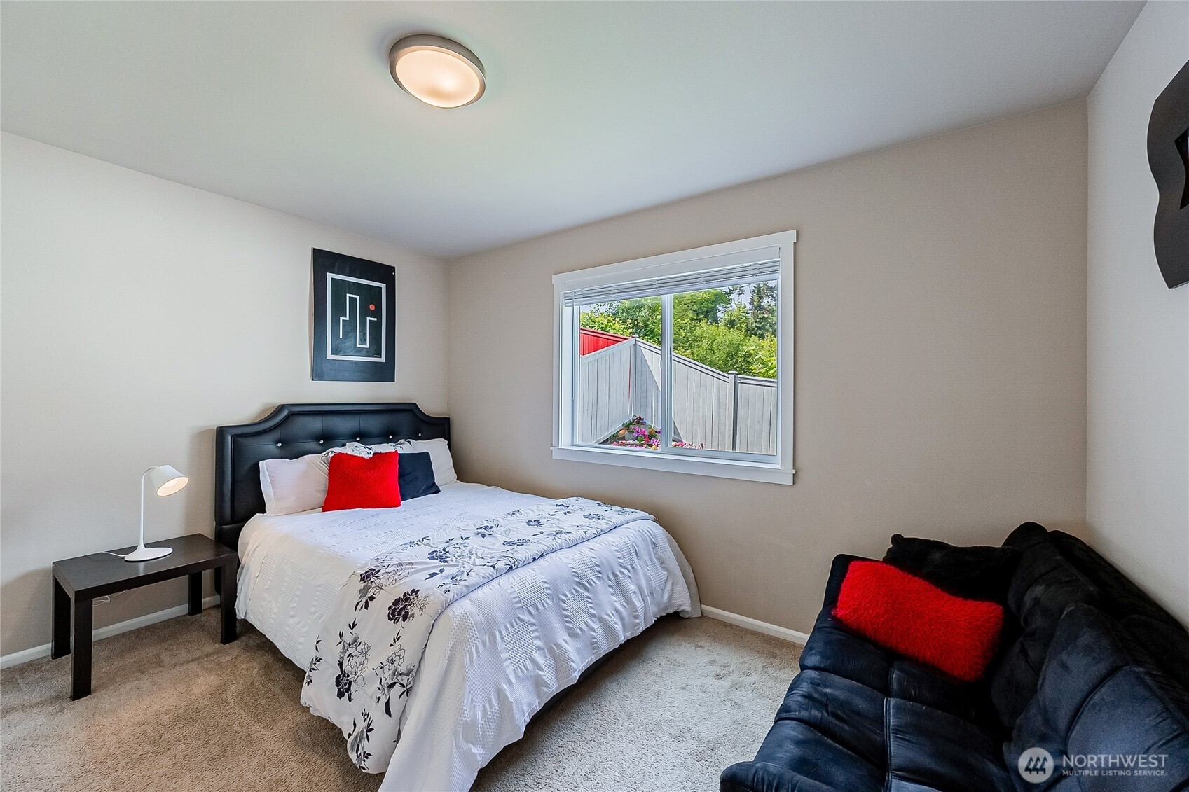 11501 87th Avenue South Seattle, WA 98178 - Photo 26 of 30 a bedroom with a bed and a window