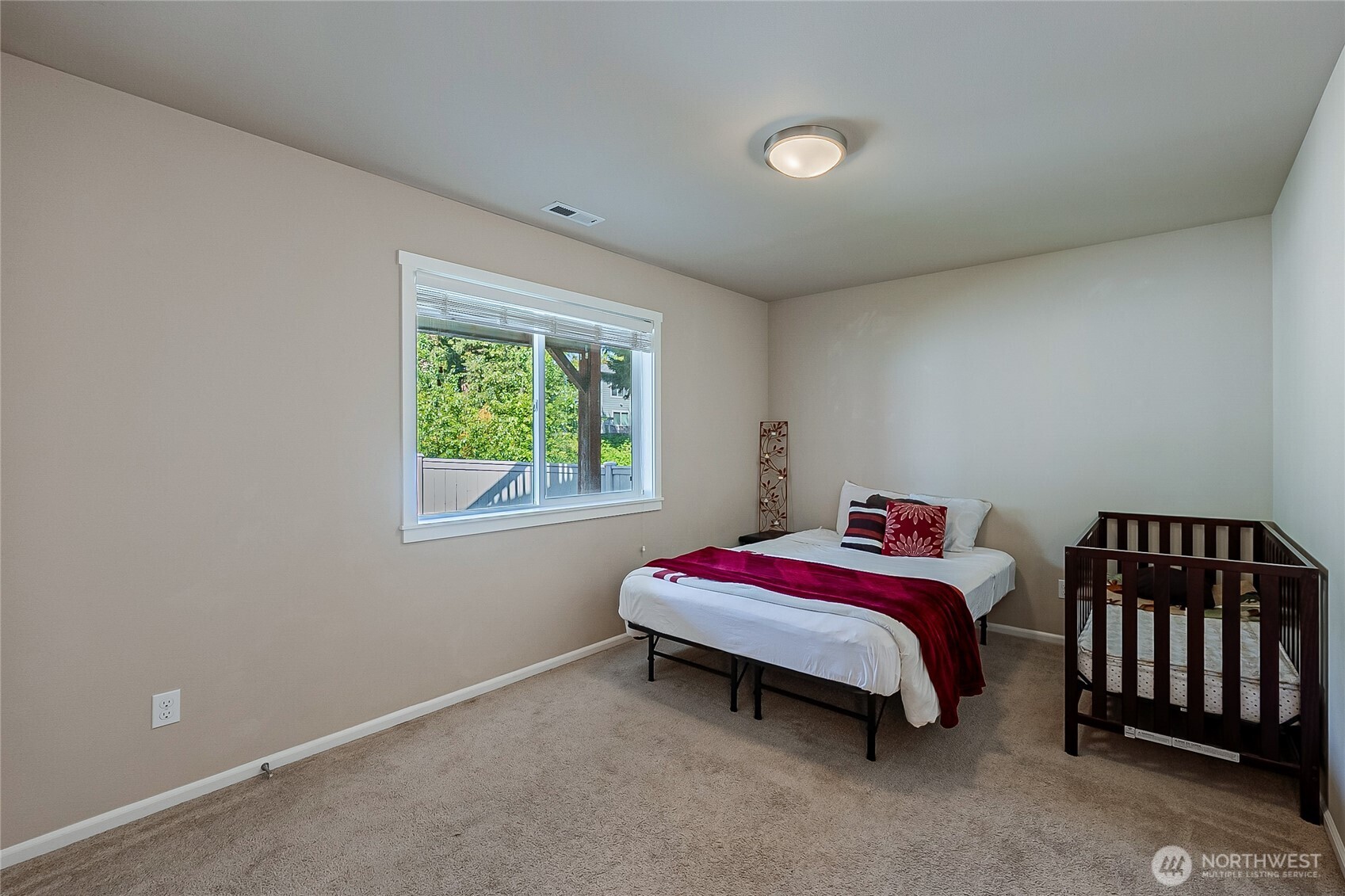 11501 87th Avenue South Seattle, WA 98178 - Photo 27 of 30 a room with a bed and a window