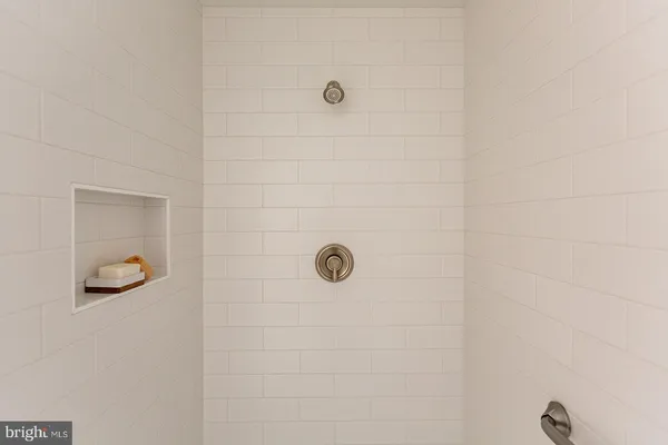 a bathroom with a toilet and a sink