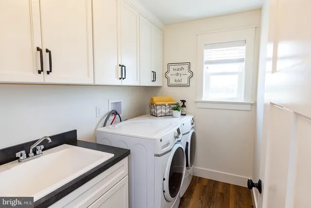 a utility room with dryer and washer