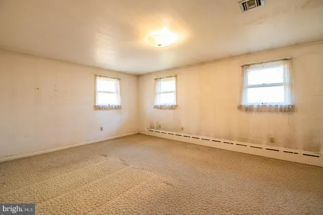 an empty room with an entryway